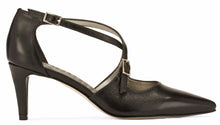 Top view of the Stella. A black leather high heel with two delicate straps that crisscross over the front. This two and a half inch heel has a pointed toe and two small buckles on the straps. Available in wide width and extra wide widths.