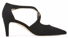 Side view of the Stella. A black micro fabric high heel with two delicate straps that crisscross over the front. This two and a half inch heel has a pointed toe and two small buckles on the straps. Available in wide width and extra wide widths.