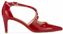 Side view of the Stella. A red patent leather high heel with two delicate straps that crisscross over the front. This two and a half inch heel has a pointed toe and two small buckles on the straps. Available in wide width and extra wide widths.